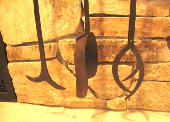 <a href="http://bighornforge.com/recent-work-simple-arts-crafts-railing-and-firetool-set/"target="blank">Arts & Crafts Fire Tool Set<a/>
<br>bottom detail